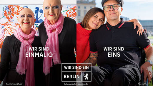 Links: Das markante Berliner Kunstduo Eva und Adele, die in dem neuen Imagefilm eines ihrer Artworks präsentieren.